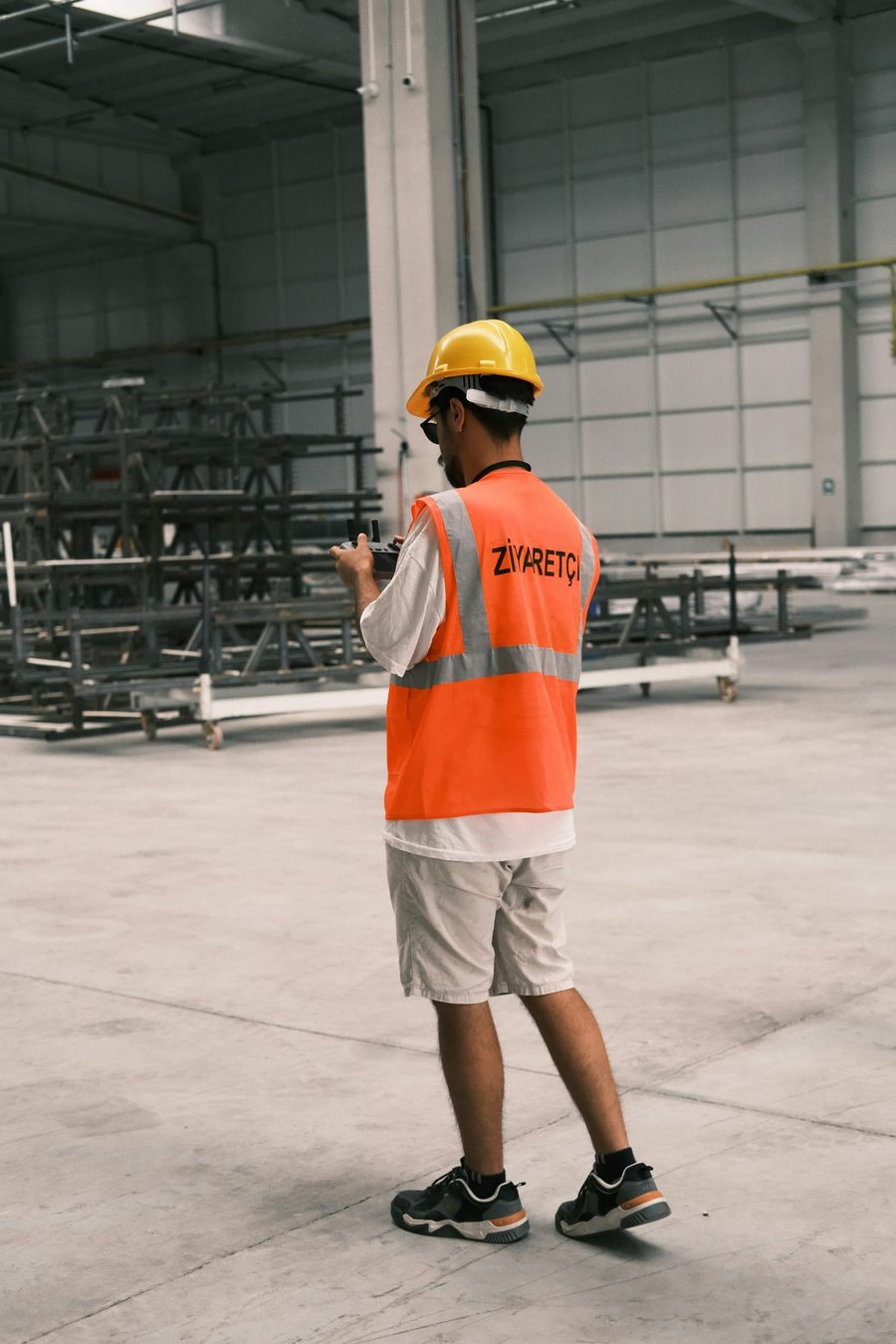 Operator in protective equipment